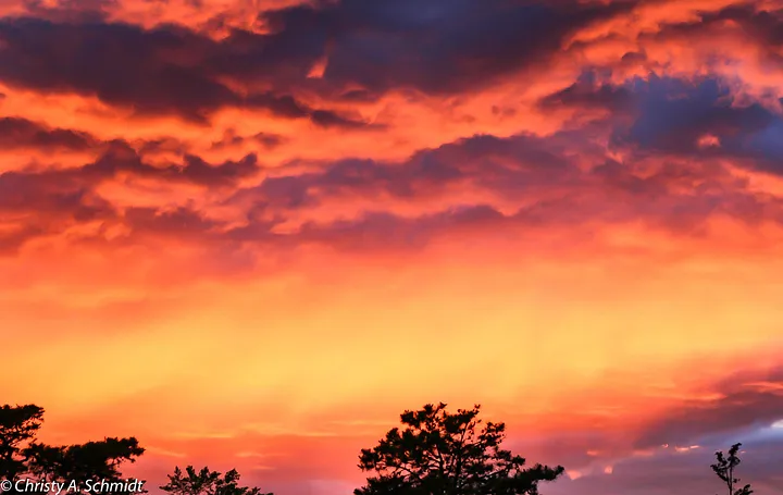 Orange and purple clouds at sunset