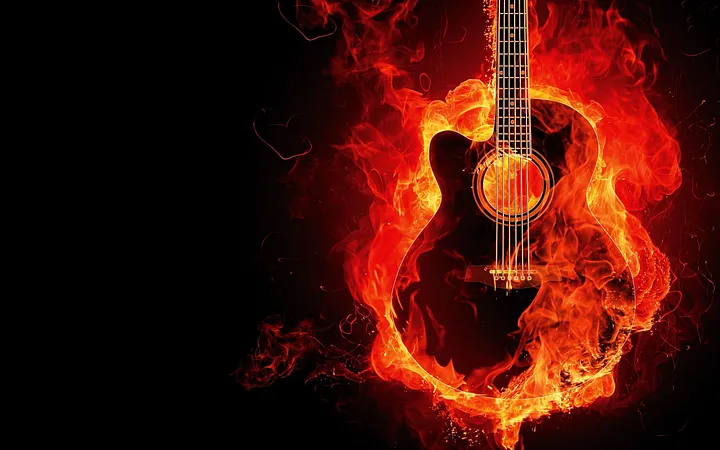 Accustic guitar on fire