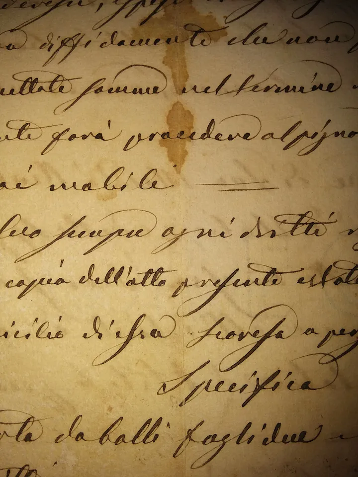 Close up of old letter with script ink writing