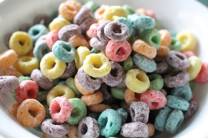 Close up of colored O cereal