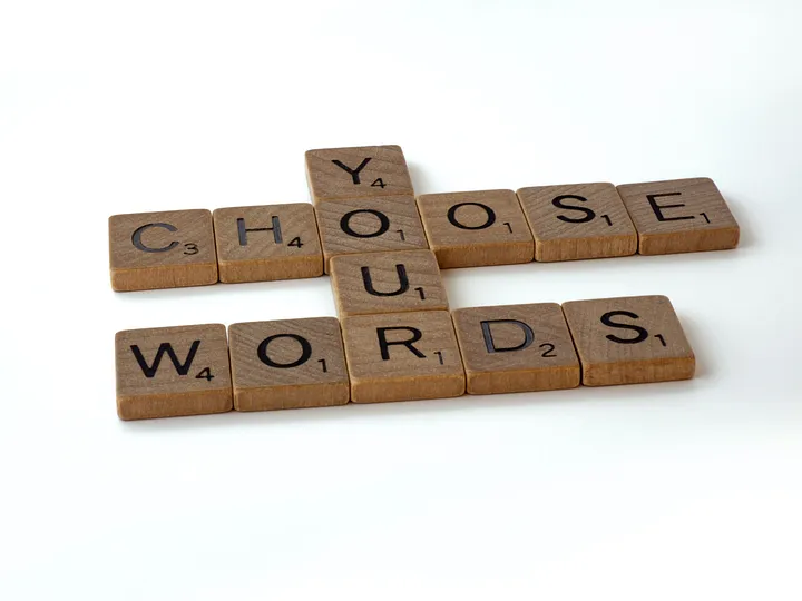 Scrabble tiles spelling choose your words